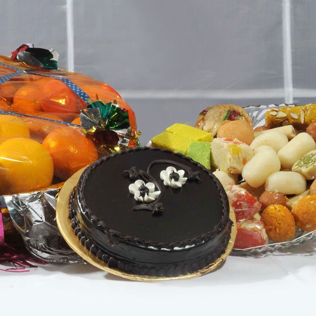 Fruits With Mithai And Cake