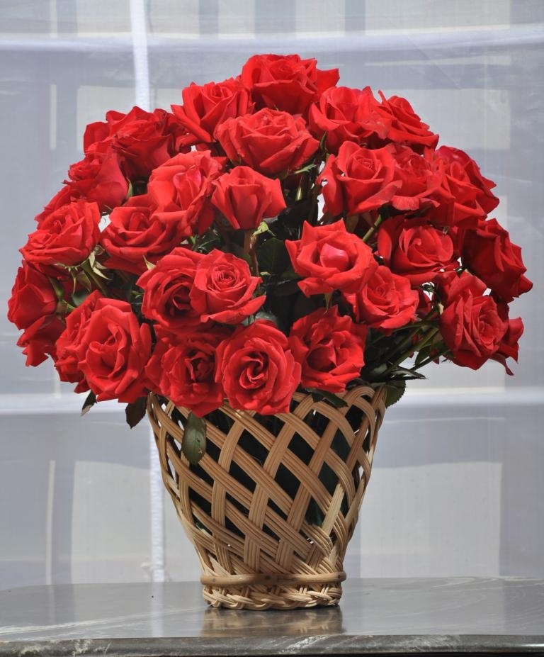 Red Roses in a Beautiful Cane Vase